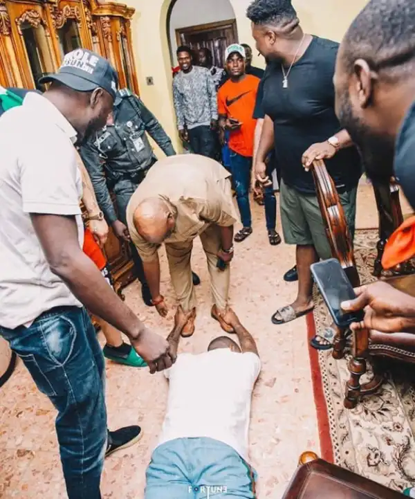 Davido Lies Down Flat For Senator Ademola Adeleke, Shares Fun Photos Together